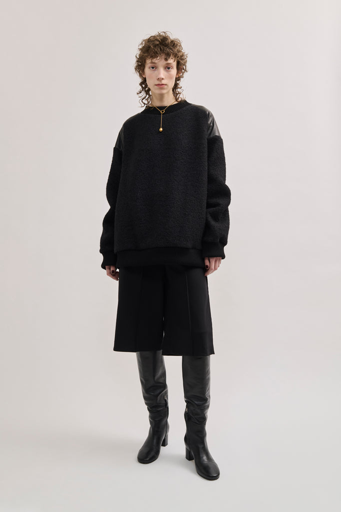 Oversized bouclé sweater with leather patches