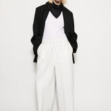 Wide-legged leather trousers white