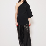 Limited edition asymmetric top