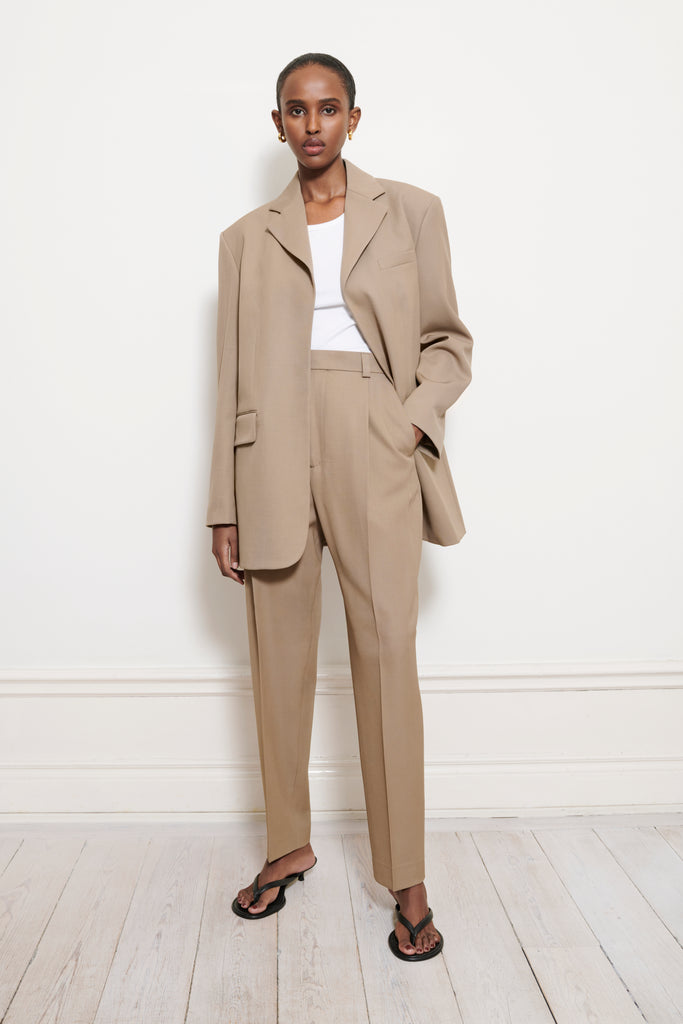 High-waisted tapered trousers beige